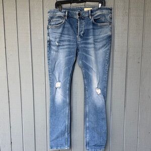 All Saints Women’s Blue Distressed Jeans
Size 34